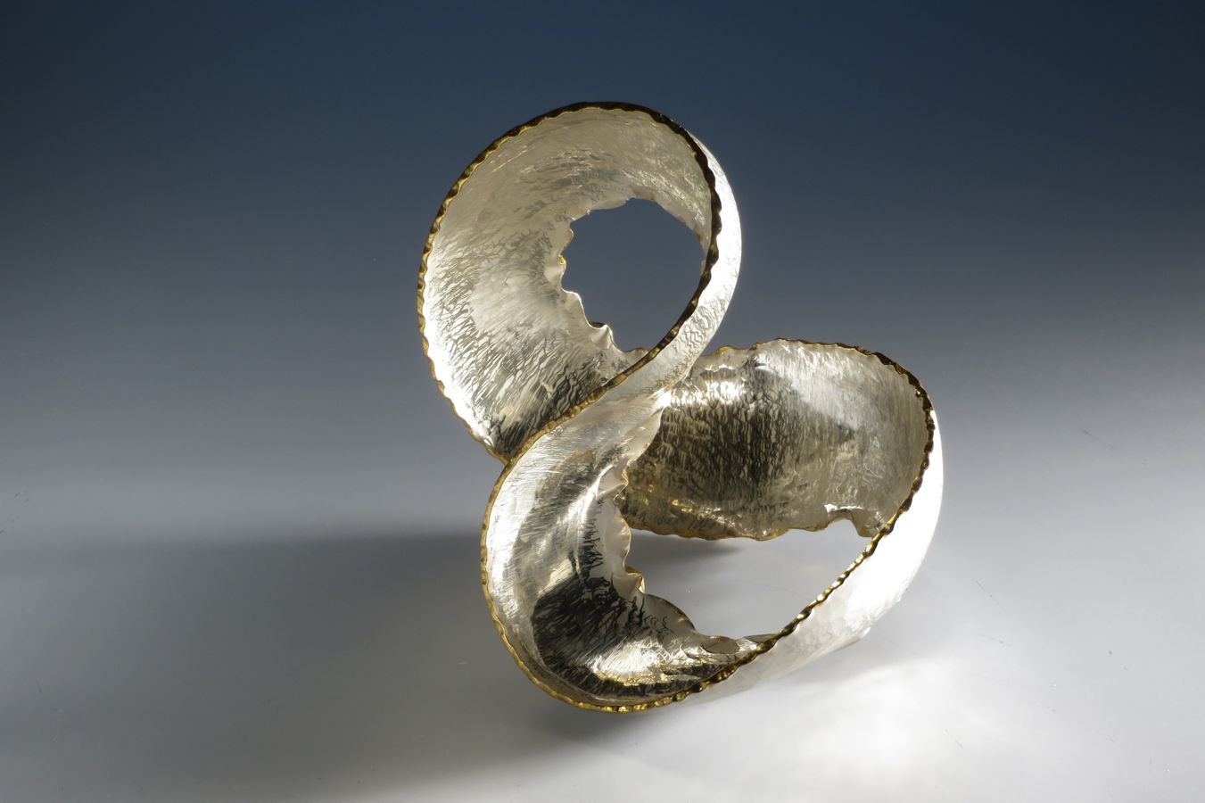 Piece -- materials: silver, gold leaf; dimensions: 14 x 12 x 11 h cm;