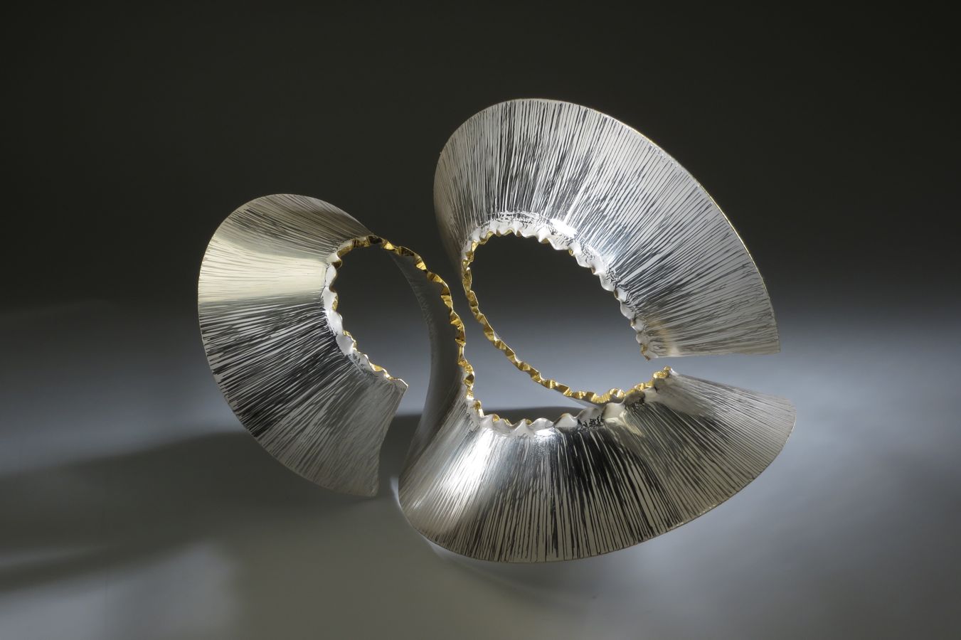 Piece -- materials: silver, gold leaf; dimensions: 38 x 32 x 26 h cm;
