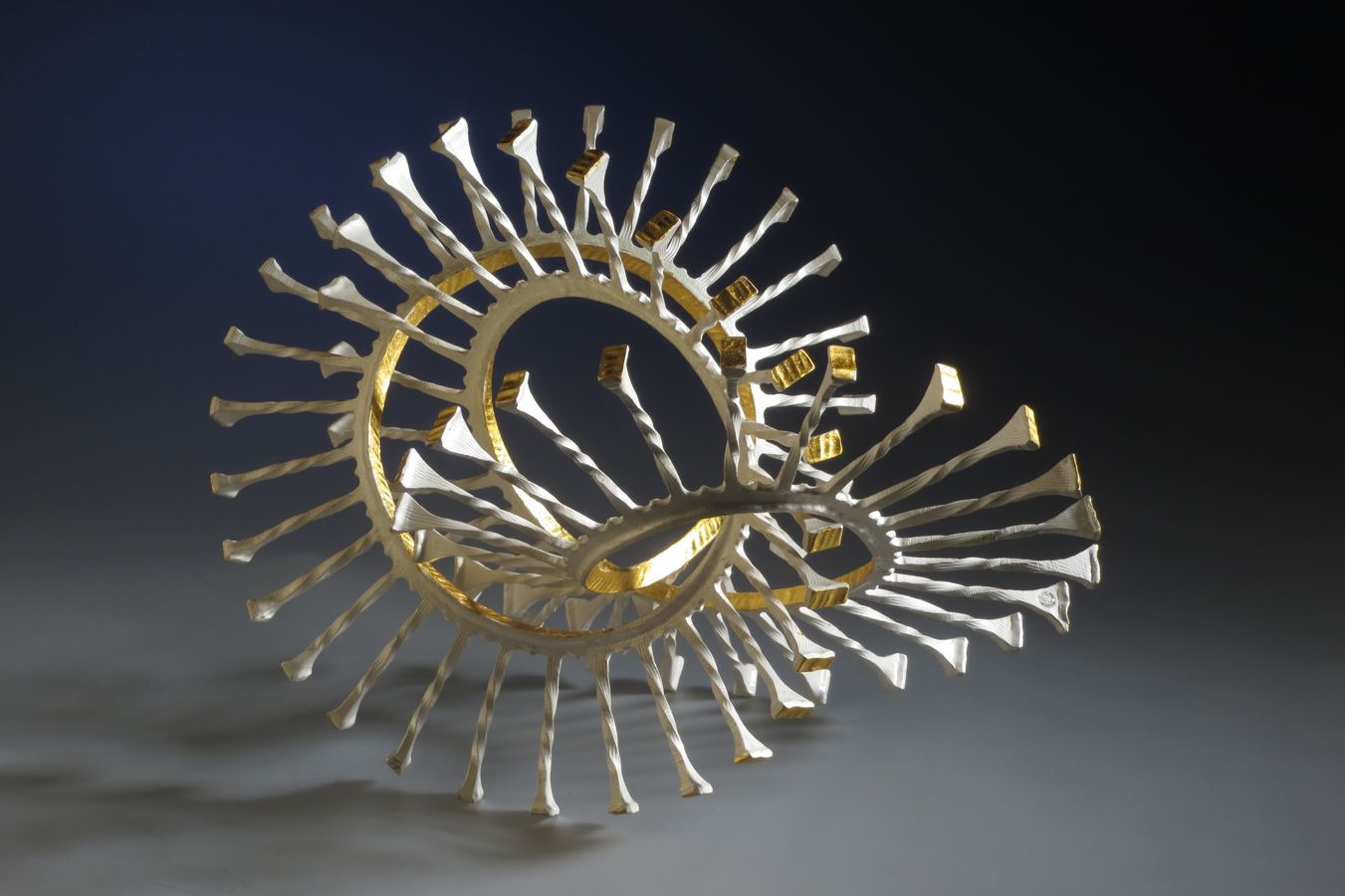 Piece -- materials: silver, gold leaf; dimensions: 22 x 29 x 23 h cm;